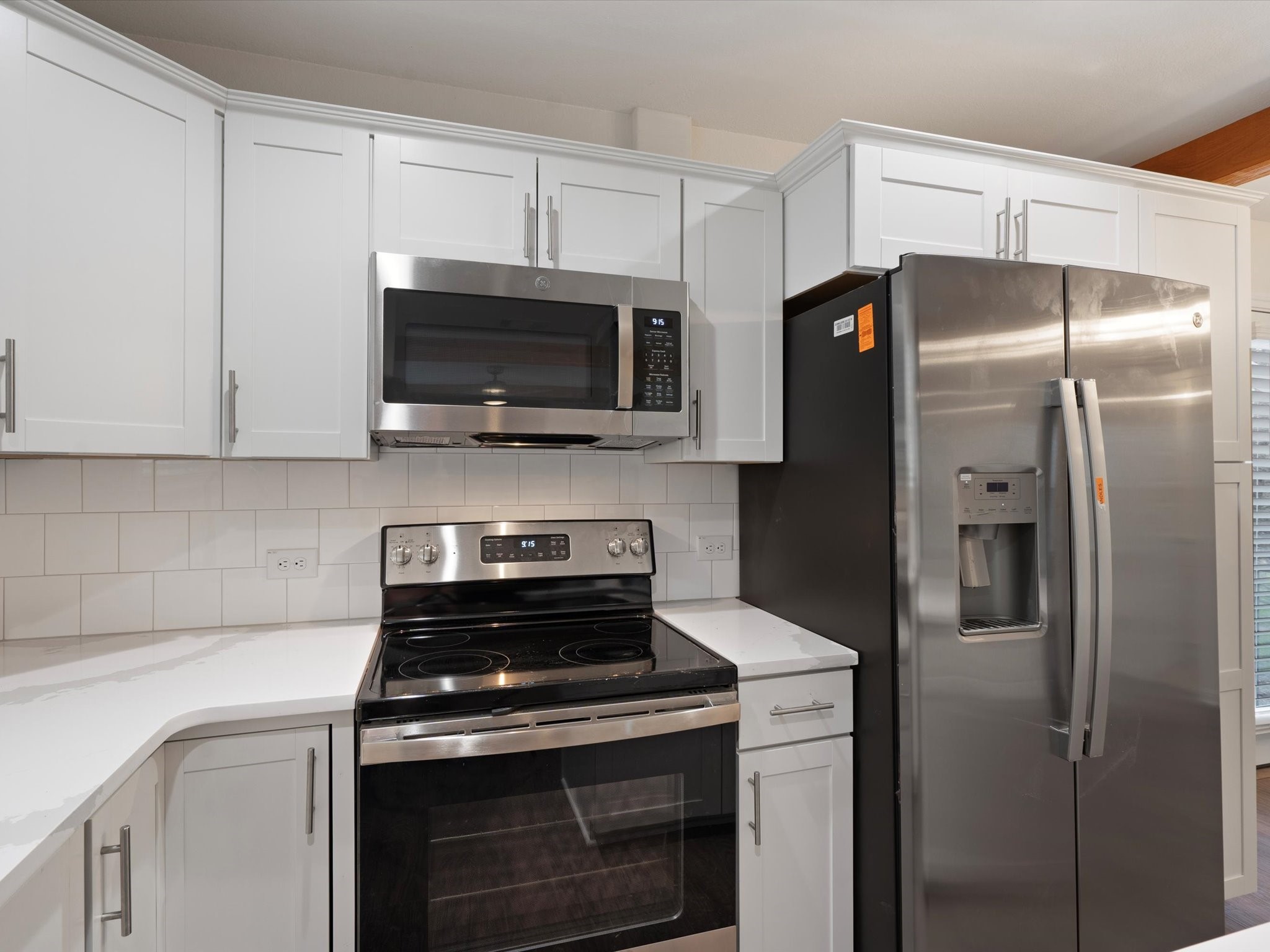 21007 Coleman Branch Creek Road Manor, TX 78653 - Photo 13 of 31 Kitchen featuring stainless steel appliances and functional layout.