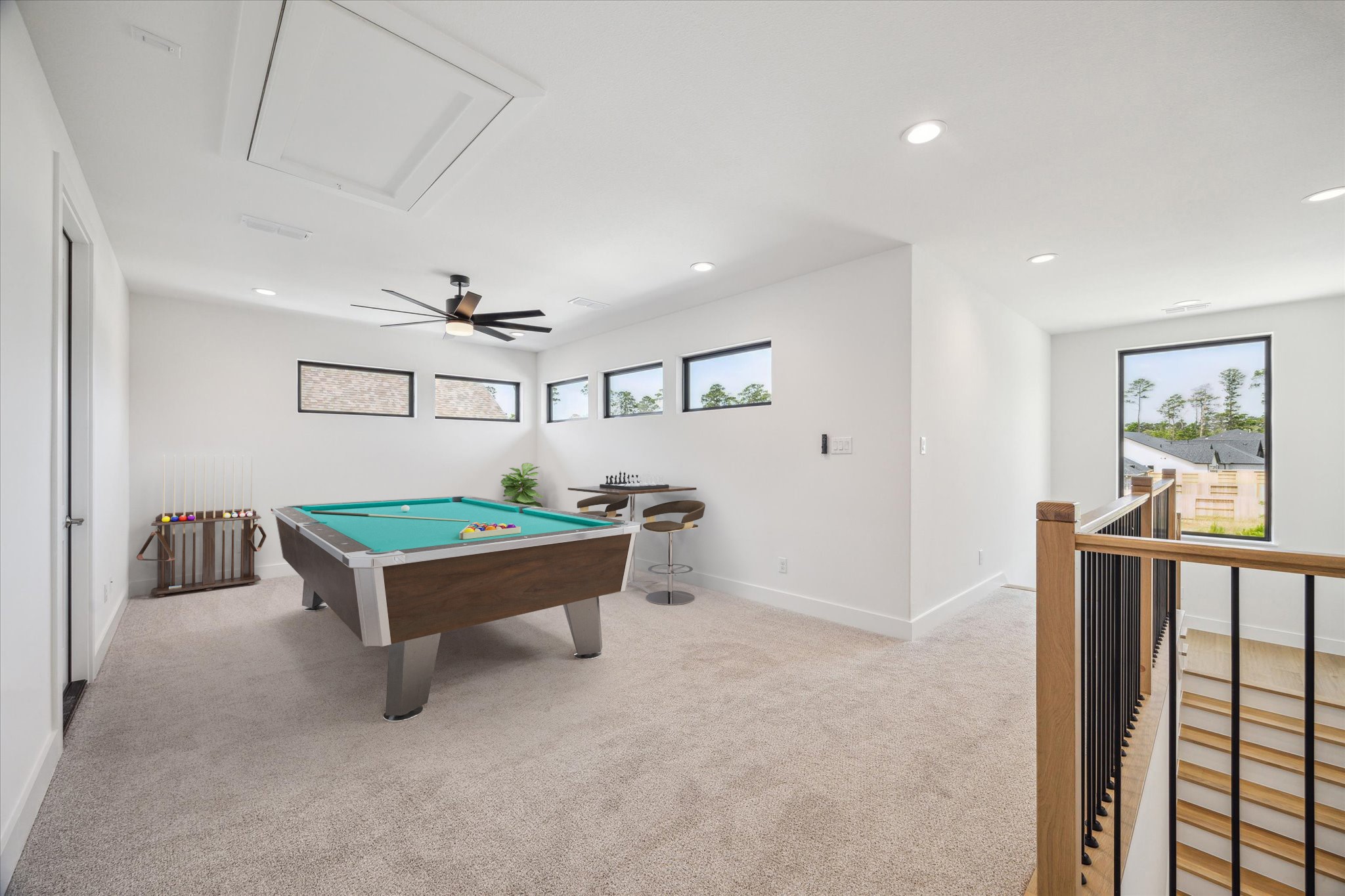 403 Venado View Court Conroe, TX 77304 - Photo 19 of 39 Upstairs loft space that easily doubles as a Game Room! This photo is virtually staged.