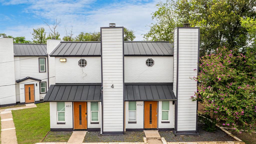 2706 Wheless Lane, Unit 401 Austin, TX 78723 - Photo 23 of 24 Clean lines and modern design define this multi-unit dwelling, offering curb appeal.