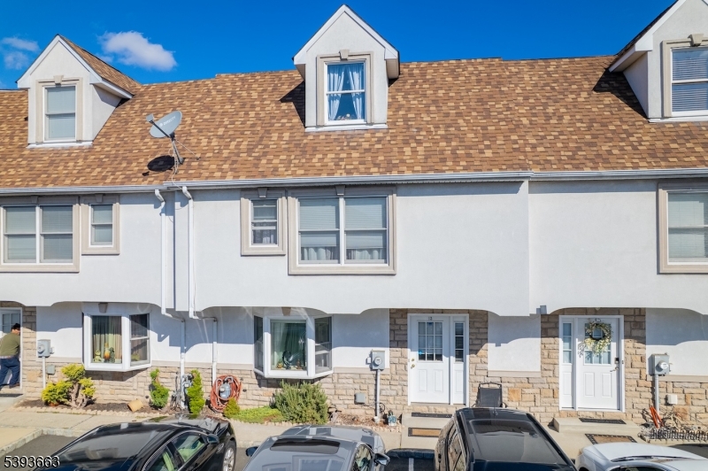 13 Valsumo Lane Newark, NJ 07105 - Photo 29 of 31 a front view of a house with glass windows