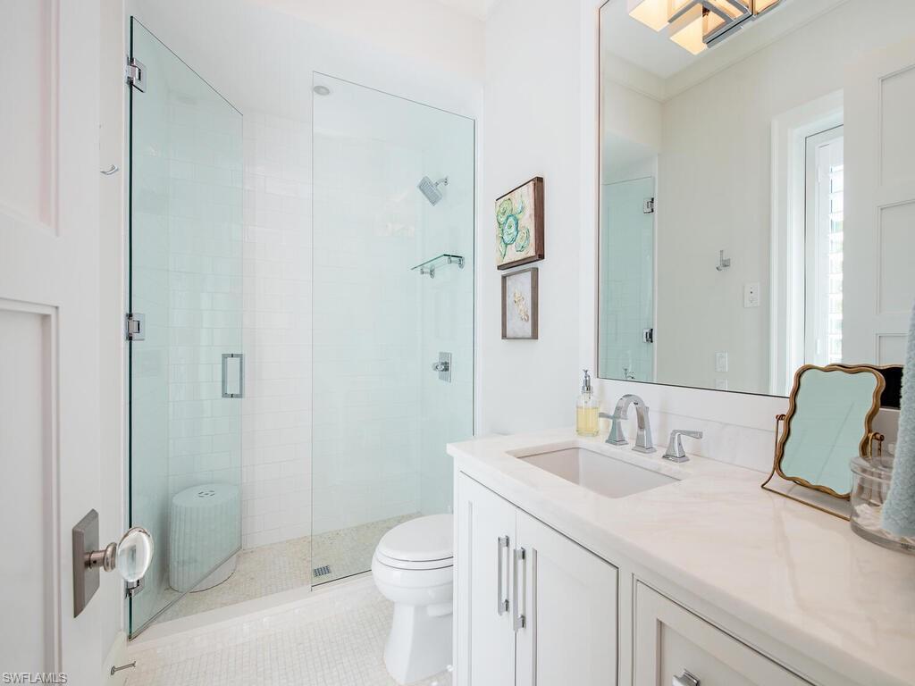 440 Springline Drive Naples, FL 34102 - Photo 21 of 28 Bathroom for bed 2 and Pool bath