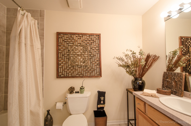 1524 South Sangamon Street, Unit 717S Chicago, IL 60608 - Photo 14 of 14 a bathroom with a toilet sink and vanity