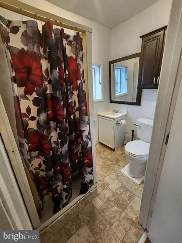 a room with lots of different colored cloths