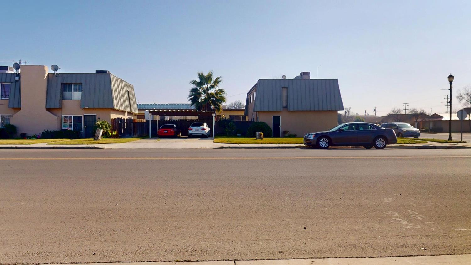 1526 8th Street Firebaugh, CA 93622 - Photo 3 of 57 a car parked on the side of the road