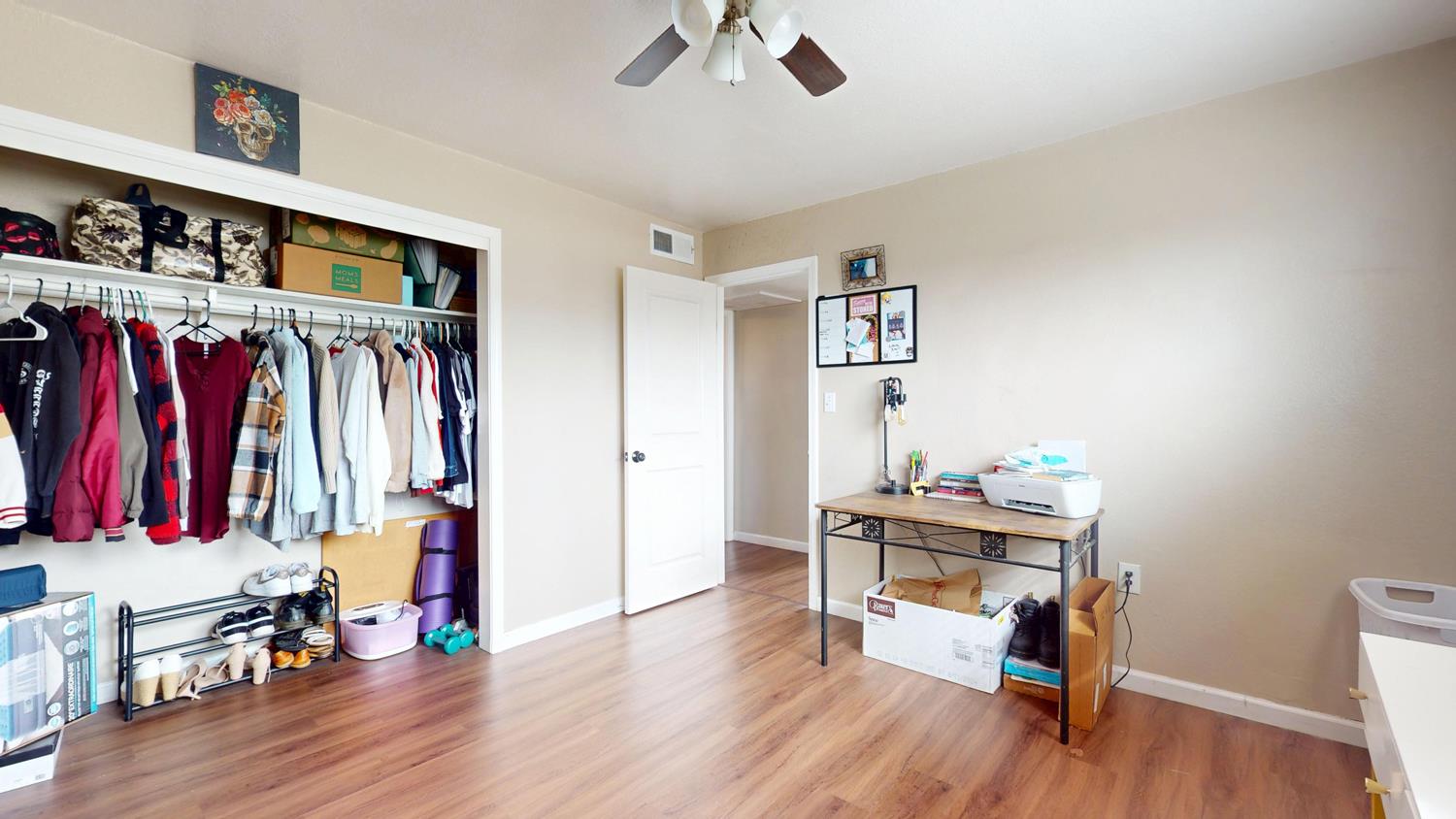 1526 8th Street Firebaugh, CA 93622 - Photo 48 of 57 a view of a room with lots of stuff and hardwood floor