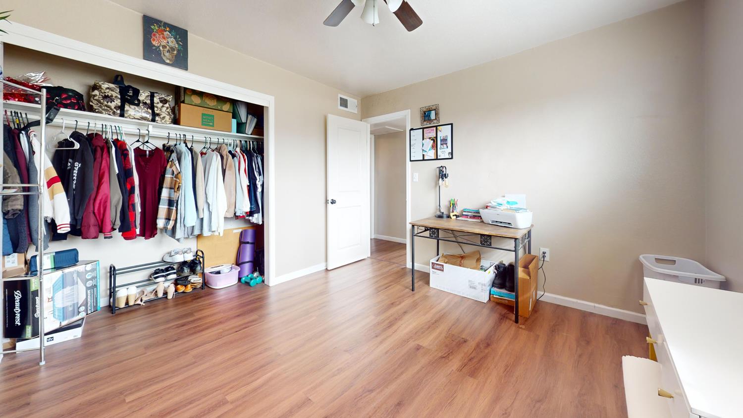 1526 8th Street Firebaugh, CA 93622 - Photo 49 of 57 a view of a room with lots of stuff and hardwood floor