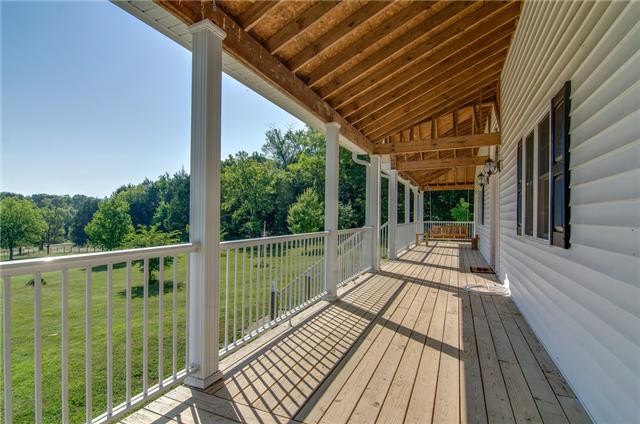 1949 Dillon Road Milton, TN 37118 - Photo 4 of 20 a view of balcony with wooden floor and fence