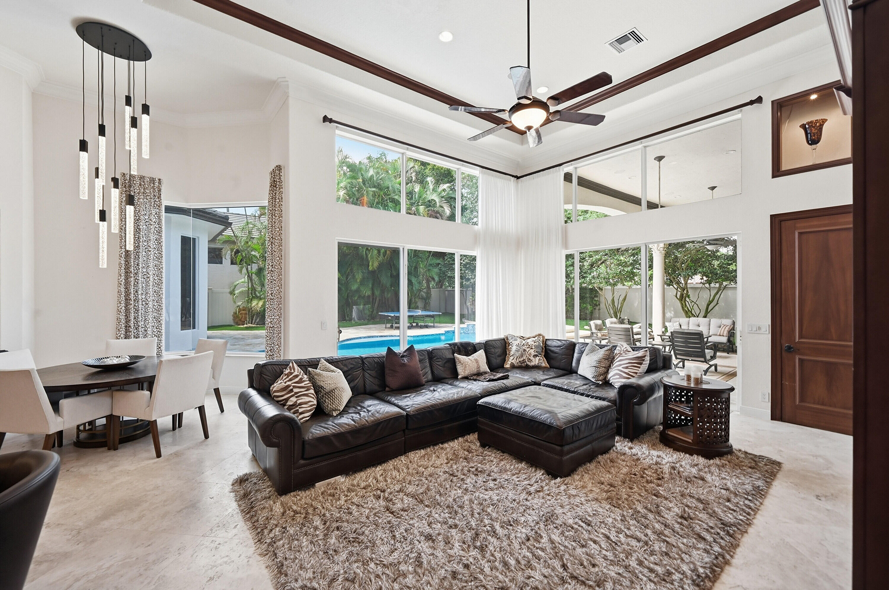 2425 Northwest 49th Lane Boca Raton, FL 33431 - Photo 22 of 46 a living room with furniture and a large window