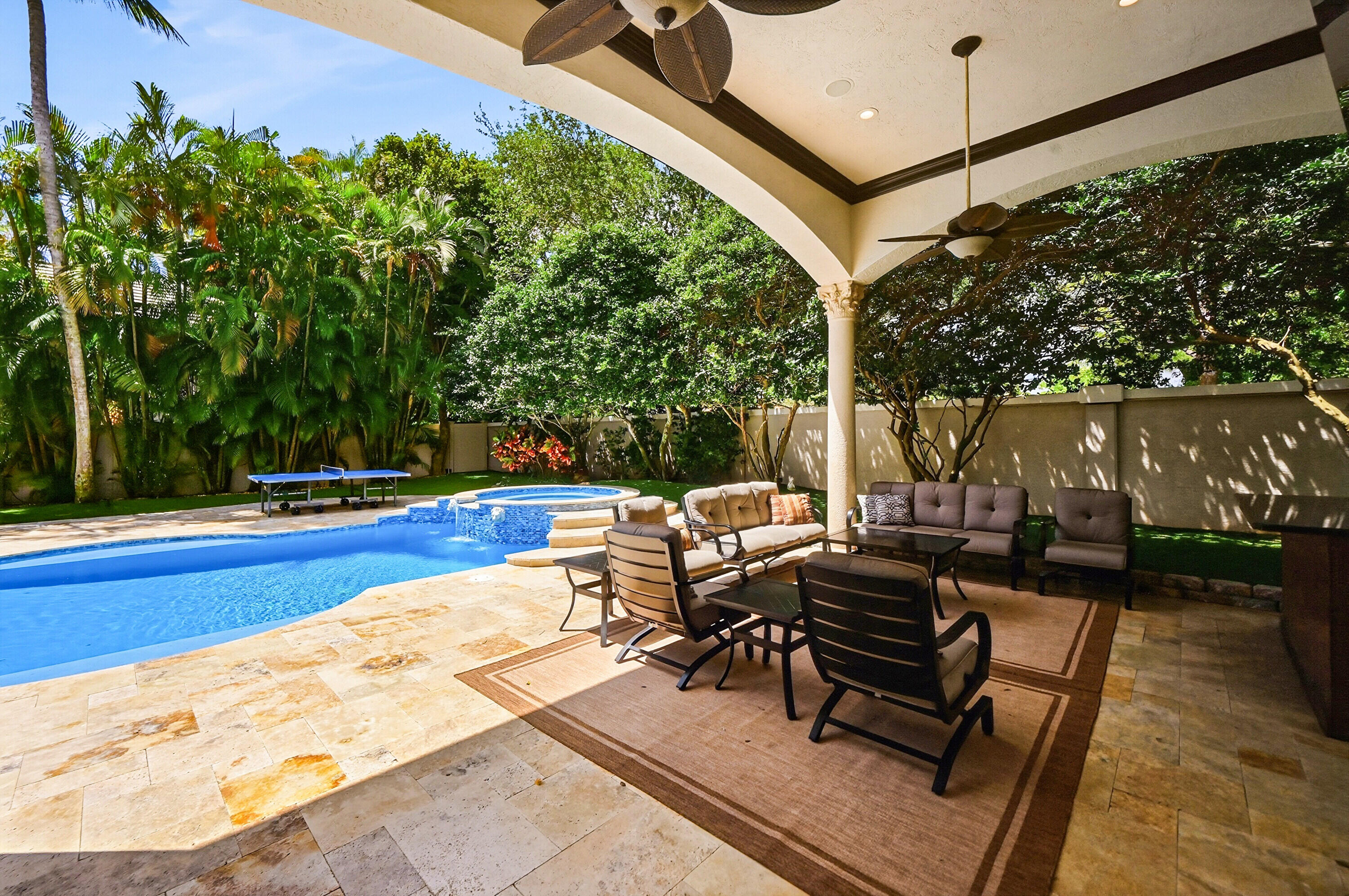 2425 Northwest 49th Lane Boca Raton, FL 33431 - Photo 42 of 46 a roof deck with couches and wooden floor