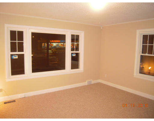 318 Boston Road Springfield, MA 01109 - Photo 6 of 16 a view of an empty room with a window