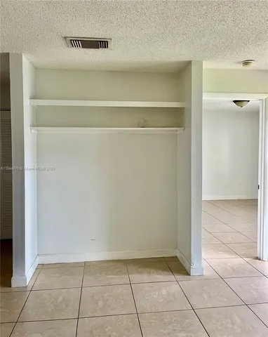 a view of a room with windows