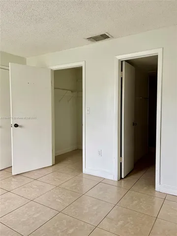 a bathroom with a sink a toilet and a shower