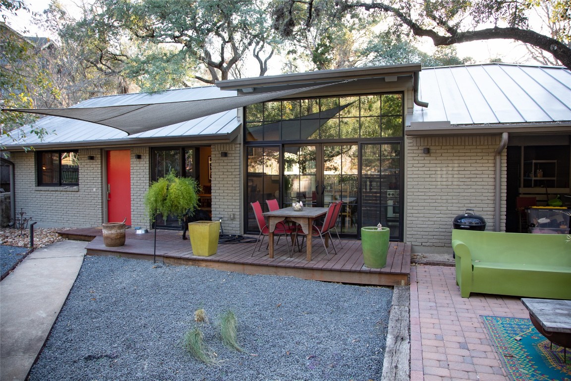 901 Avondale Road Austin, TX 78704 - Photo 1 of 1 a view of a chairs and table in the patio in front of a house