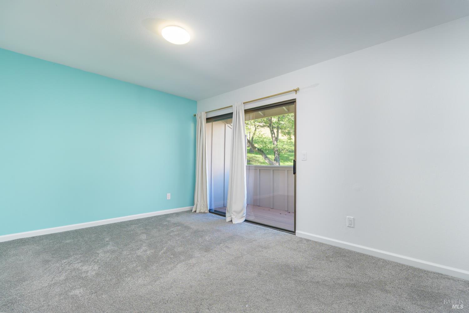19 Burdell Court Novato, CA 94949 - Photo 13 of 27 a view of an empty room and a window