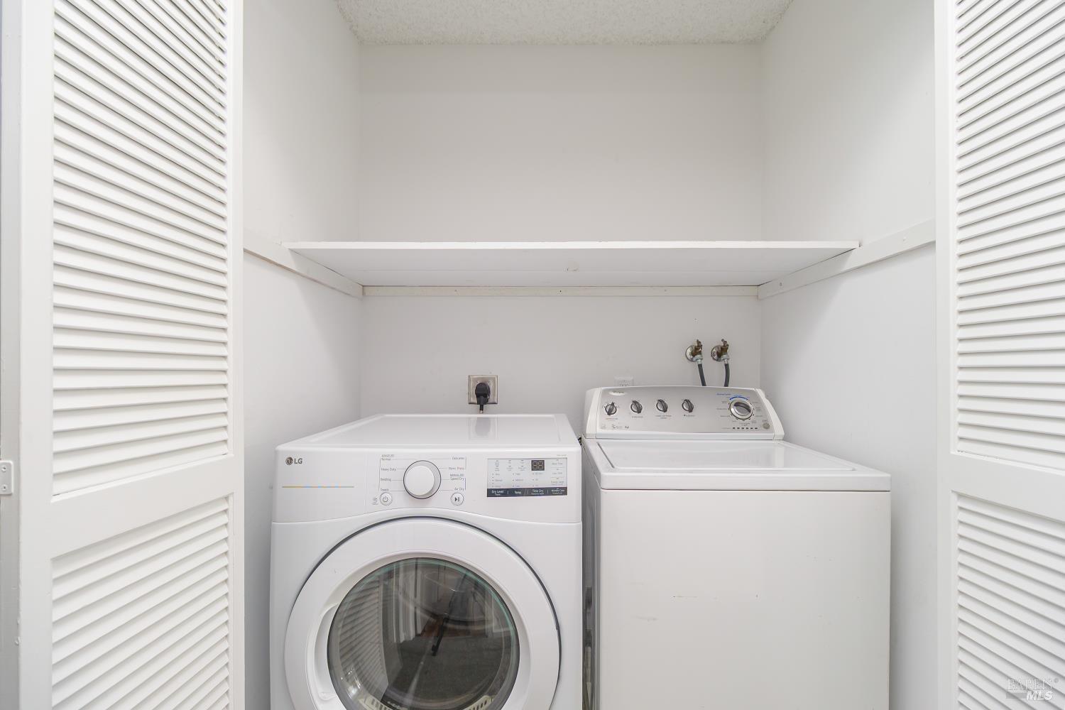 19 Burdell Court Novato, CA 94949 - Photo 20 of 27 a utility room with dryer and washer