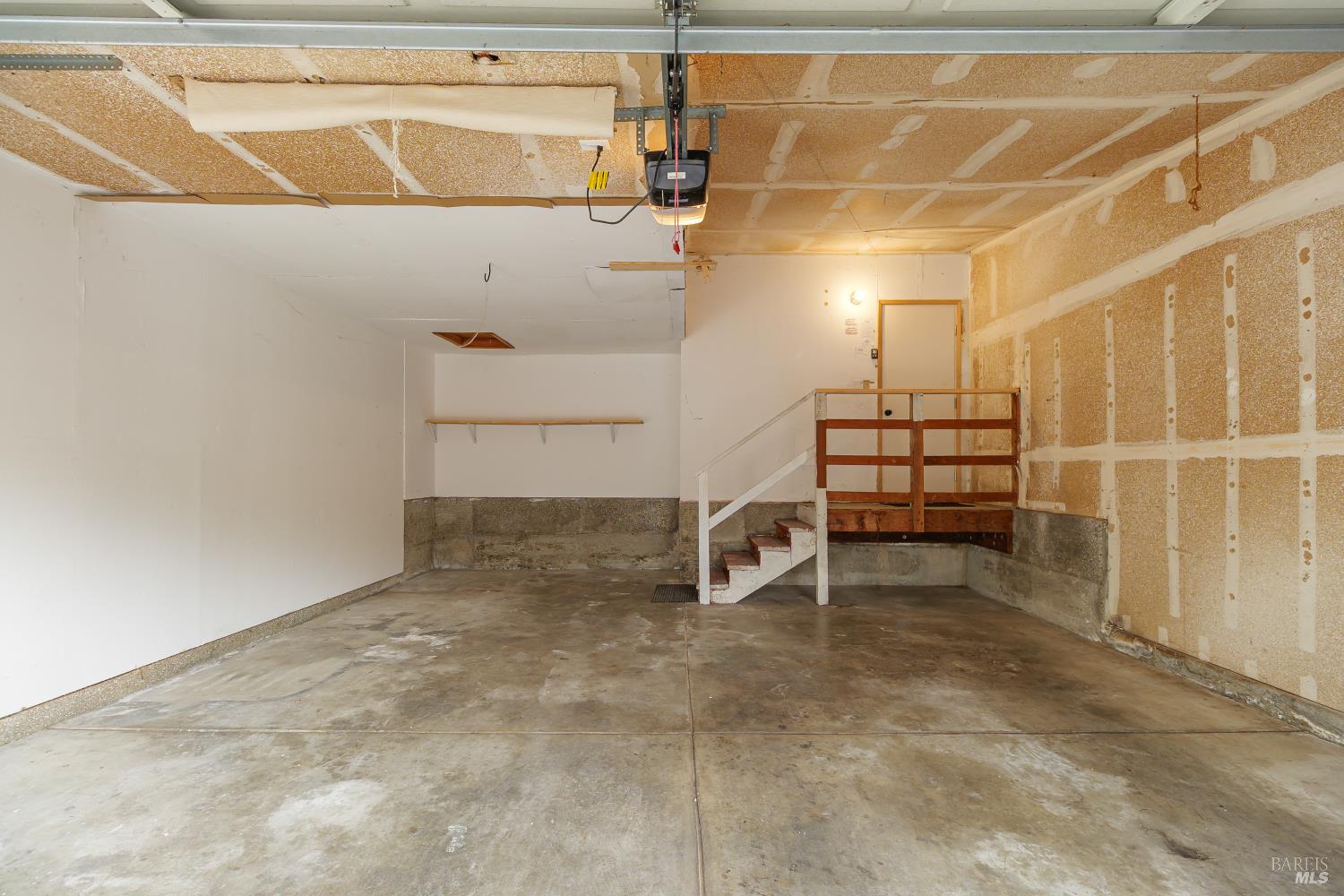 19 Burdell Court Novato, CA 94949 - Photo 25 of 27 a view of a room with racks on the wall