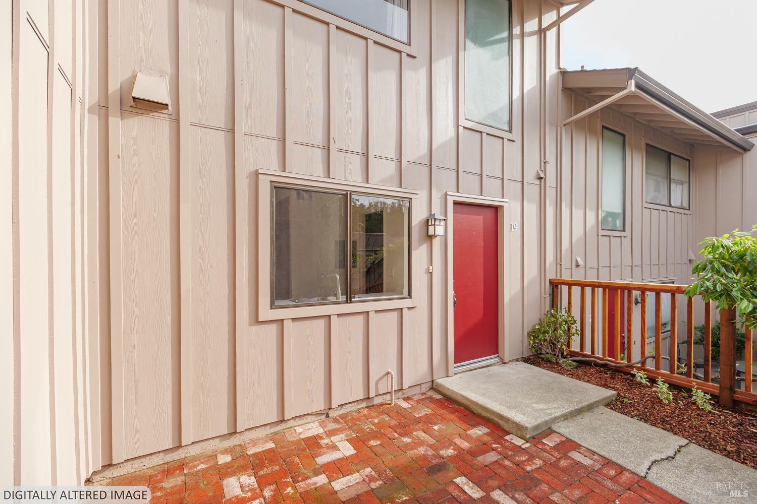 19 Burdell Court Novato, CA 94949 - Photo 3 of 27 a view of a house with a door and wooden floor