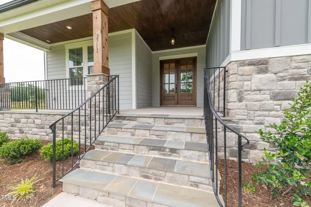 a view of entrance gate of a house