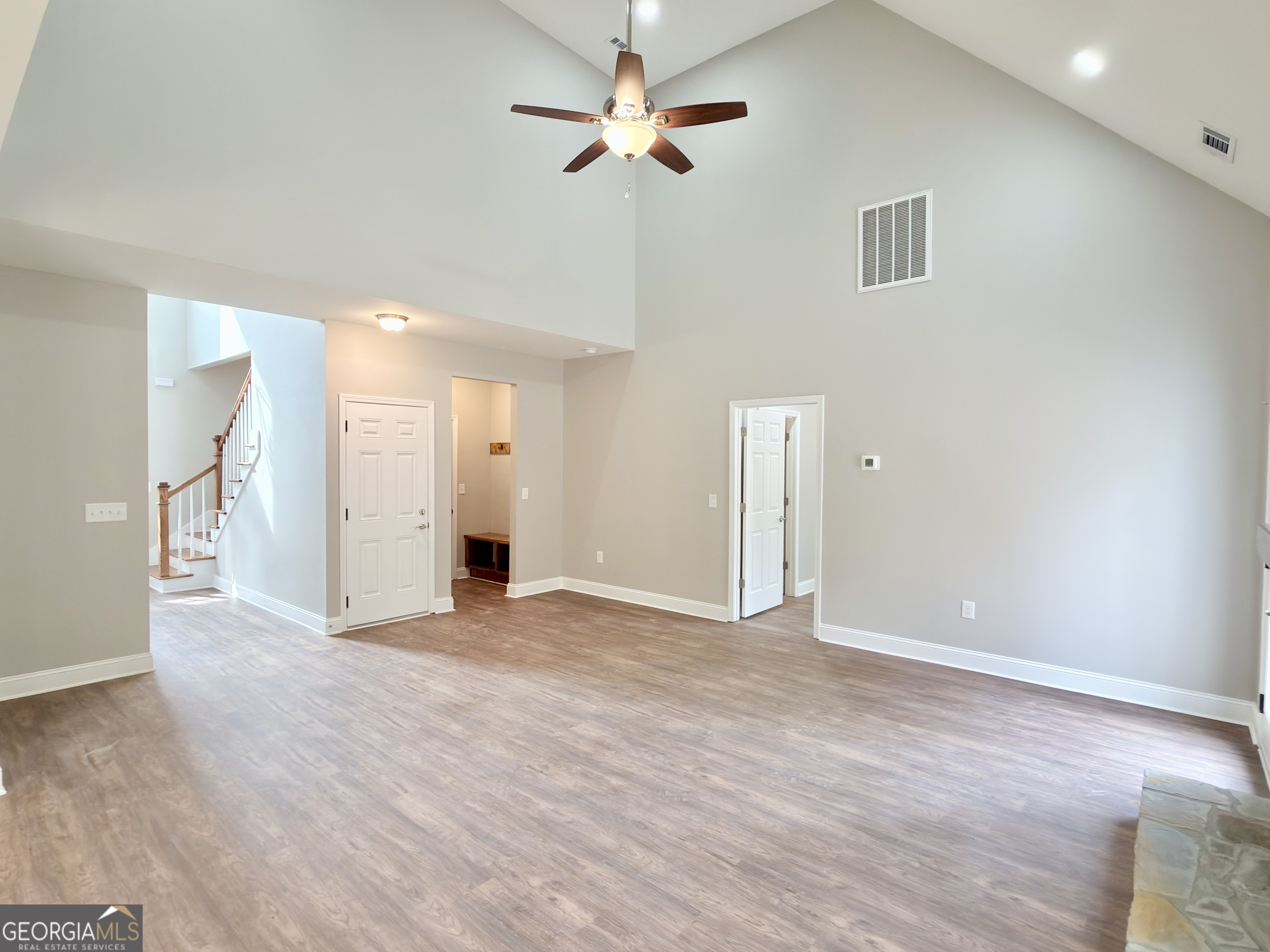 8 Bush Arbor Place Rome, GA 30165 - Photo 18 of 42 a view of an empty room with a ceiling fan