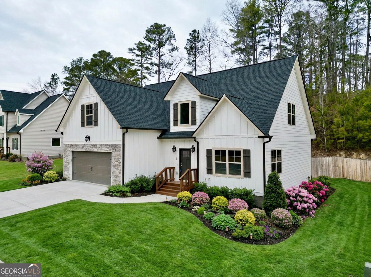 8 Bush Arbor Place Rome, GA 30165 - Photo 2 of 42 a front view of house with a garden