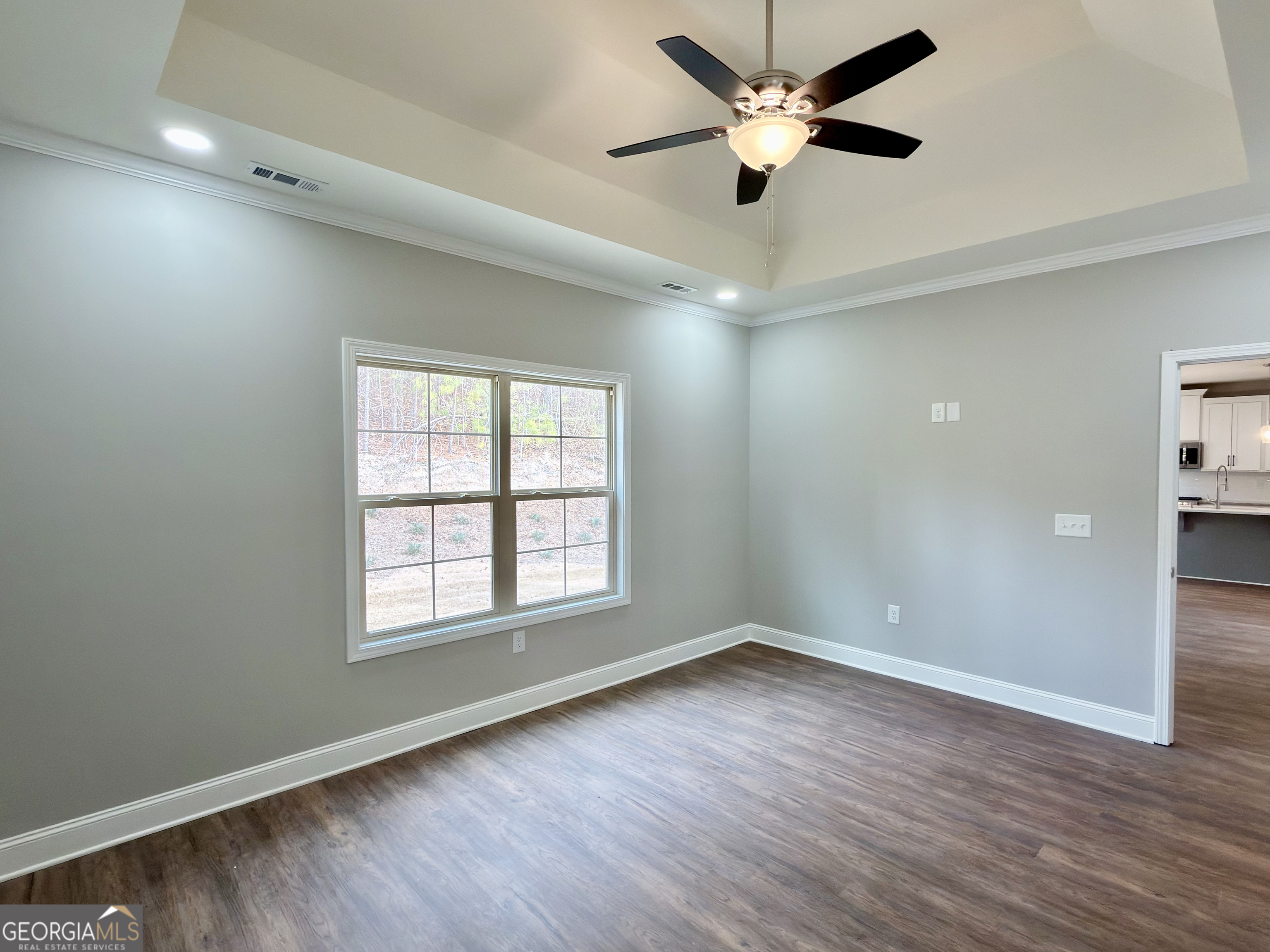 8 Bush Arbor Place Rome, GA 30165 - Photo 21 of 42 a view of an empty room with window and wooden floor
