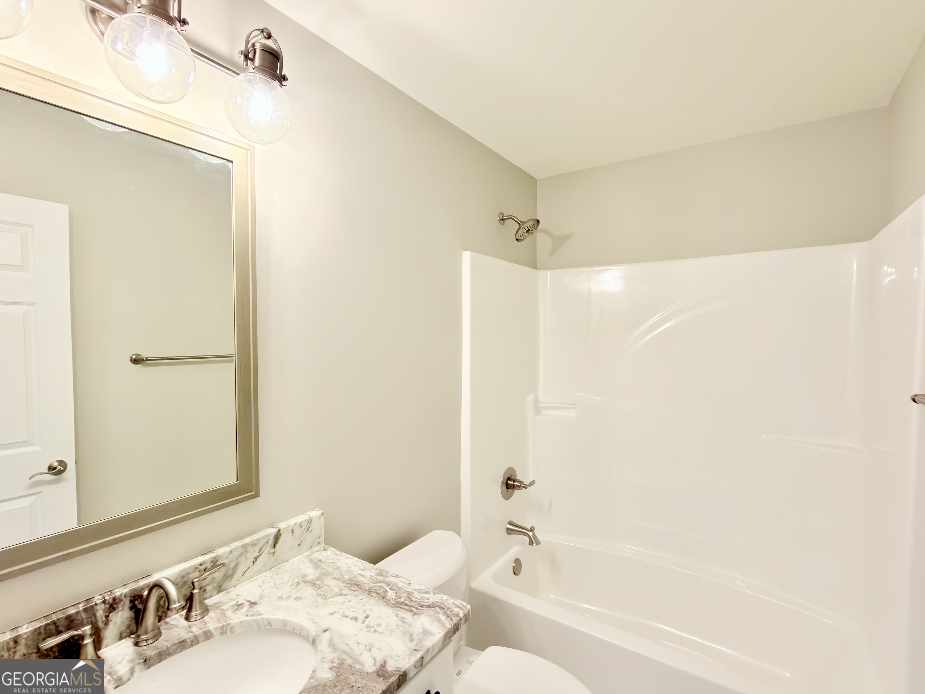 8 Bush Arbor Place Rome, GA 30165 - Photo 33 of 42 a bathroom with a bathtub and a sink