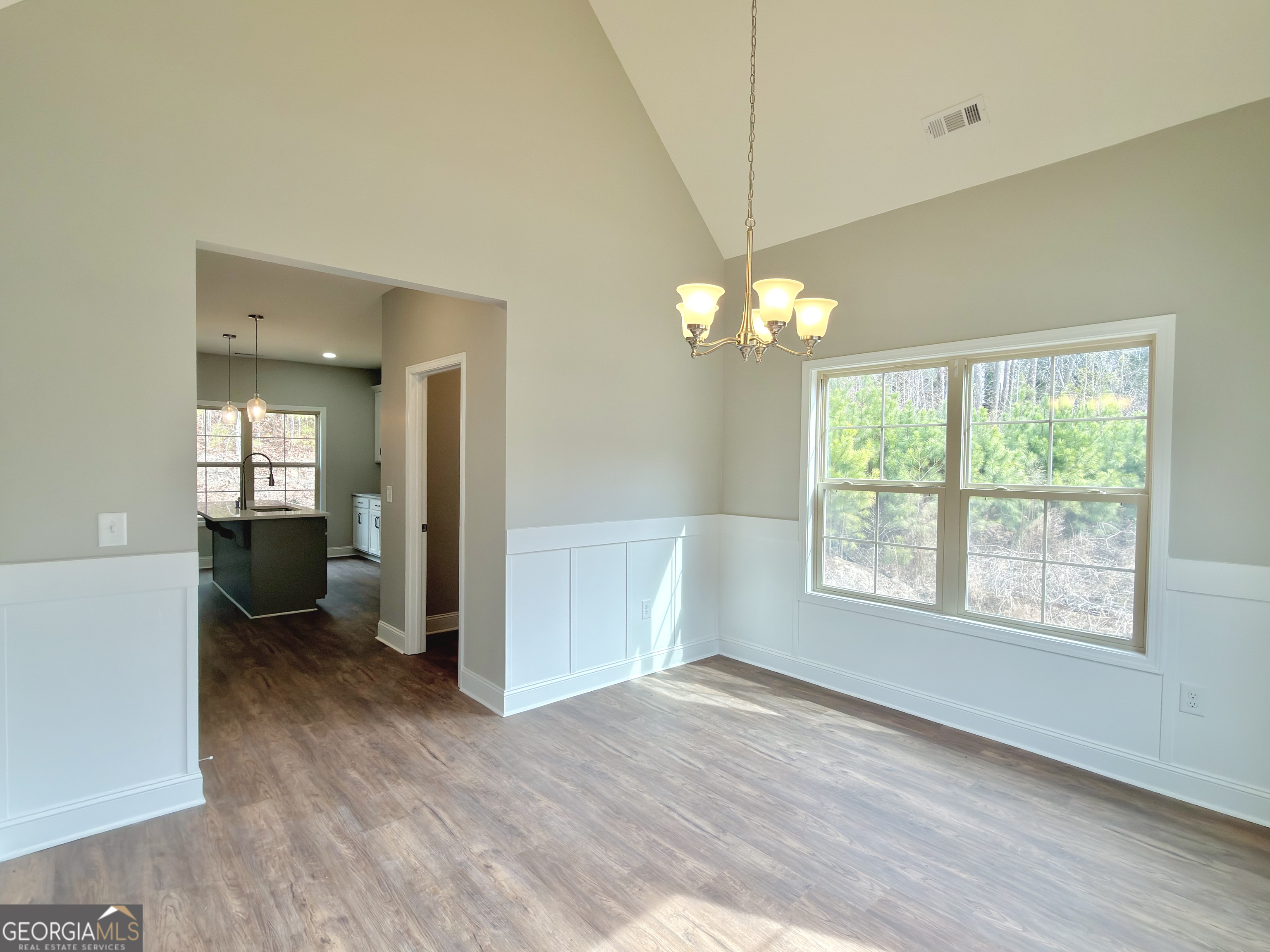 8 Bush Arbor Place Rome, GA 30165 - Photo 6 of 42 wooden floor in an empty room with a window