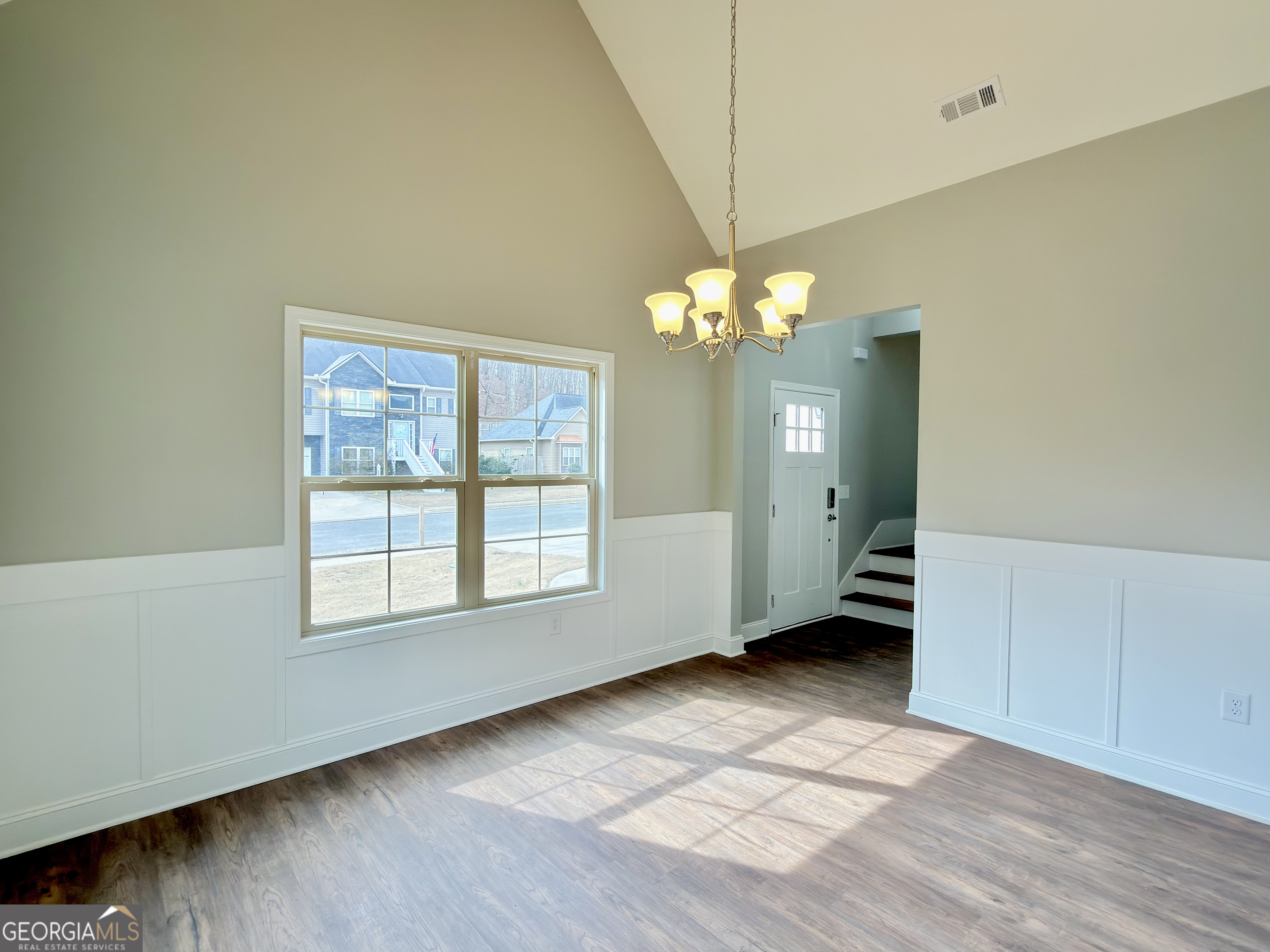 8 Bush Arbor Place Rome, GA 30165 - Photo 8 of 42 an empty room with wooden floor and windows