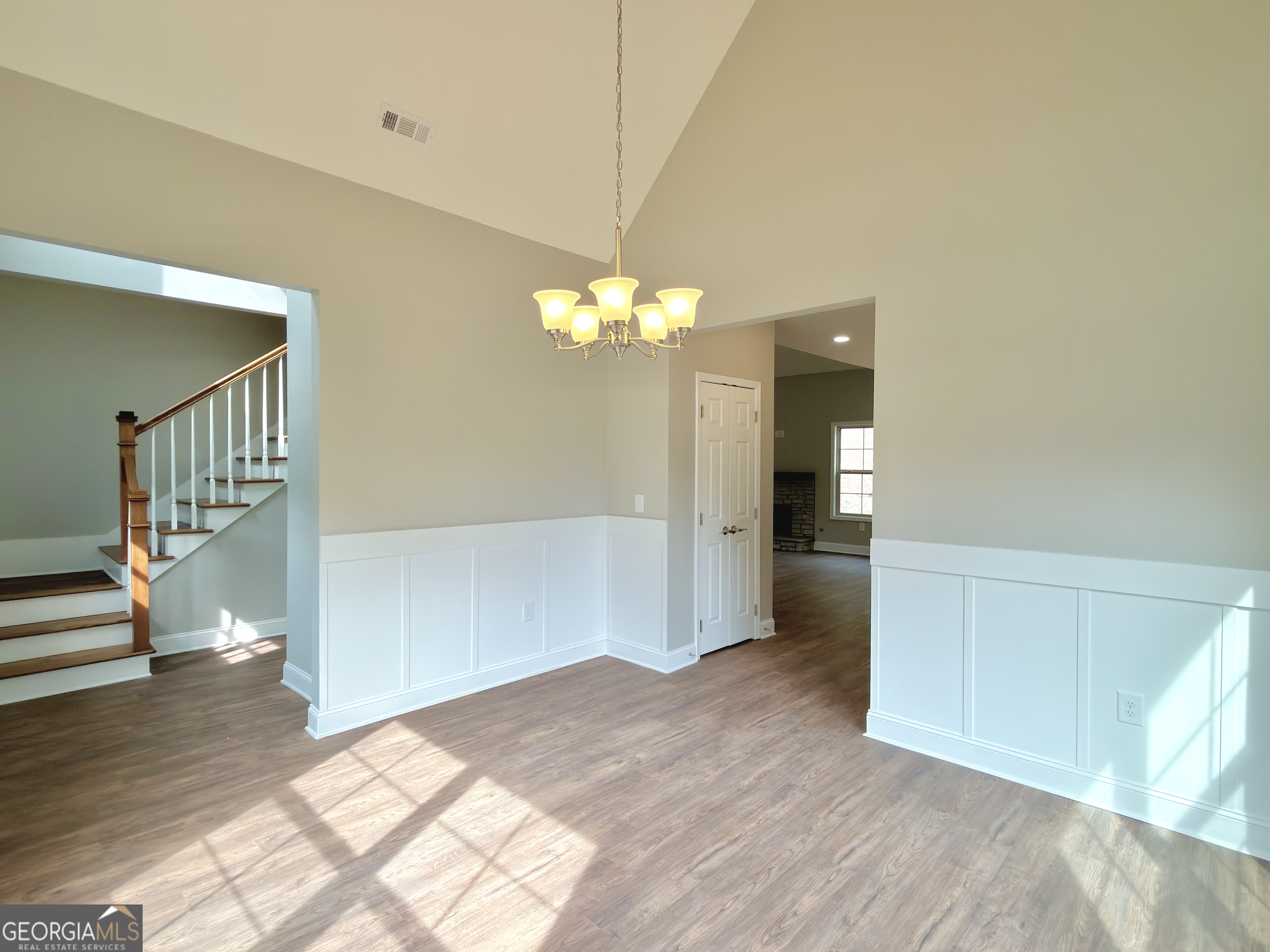 8 Bush Arbor Place Rome, GA 30165 - Photo 9 of 42 a view of a hallway with wooden floor and staircase