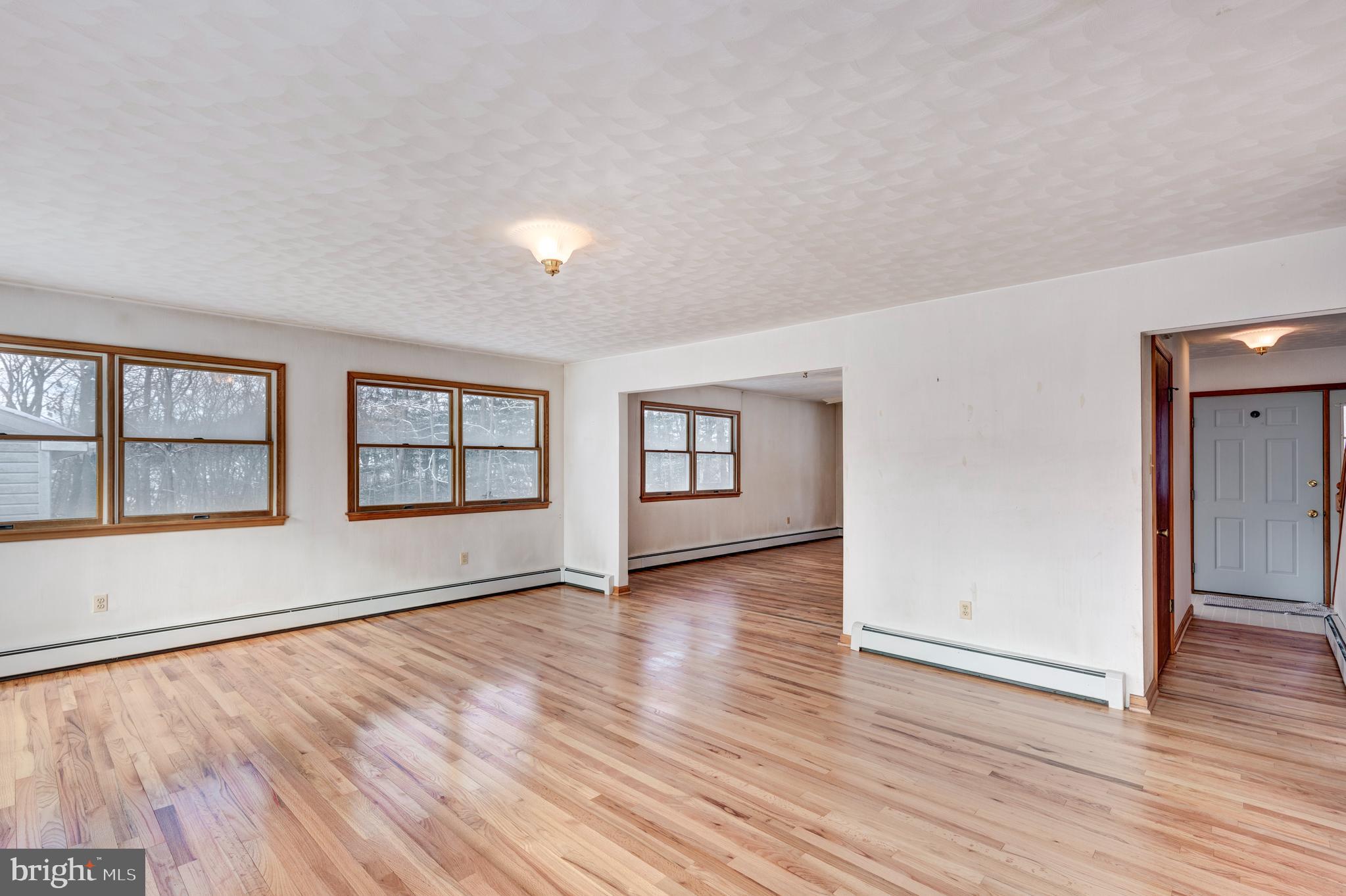 4437 Dave Rill Road Hampstead, MD 21074 - Photo 24 of 68 wooden floor in an empty room with a window