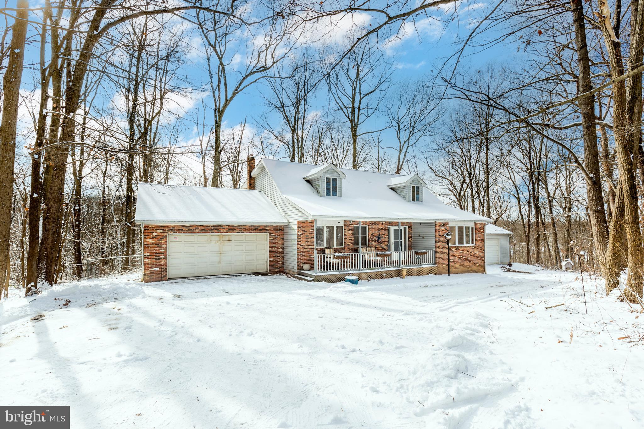 4437 Dave Rill Road Hampstead, MD 21074 - Photo 63 of 68 a view of the house with a yard covered in snow