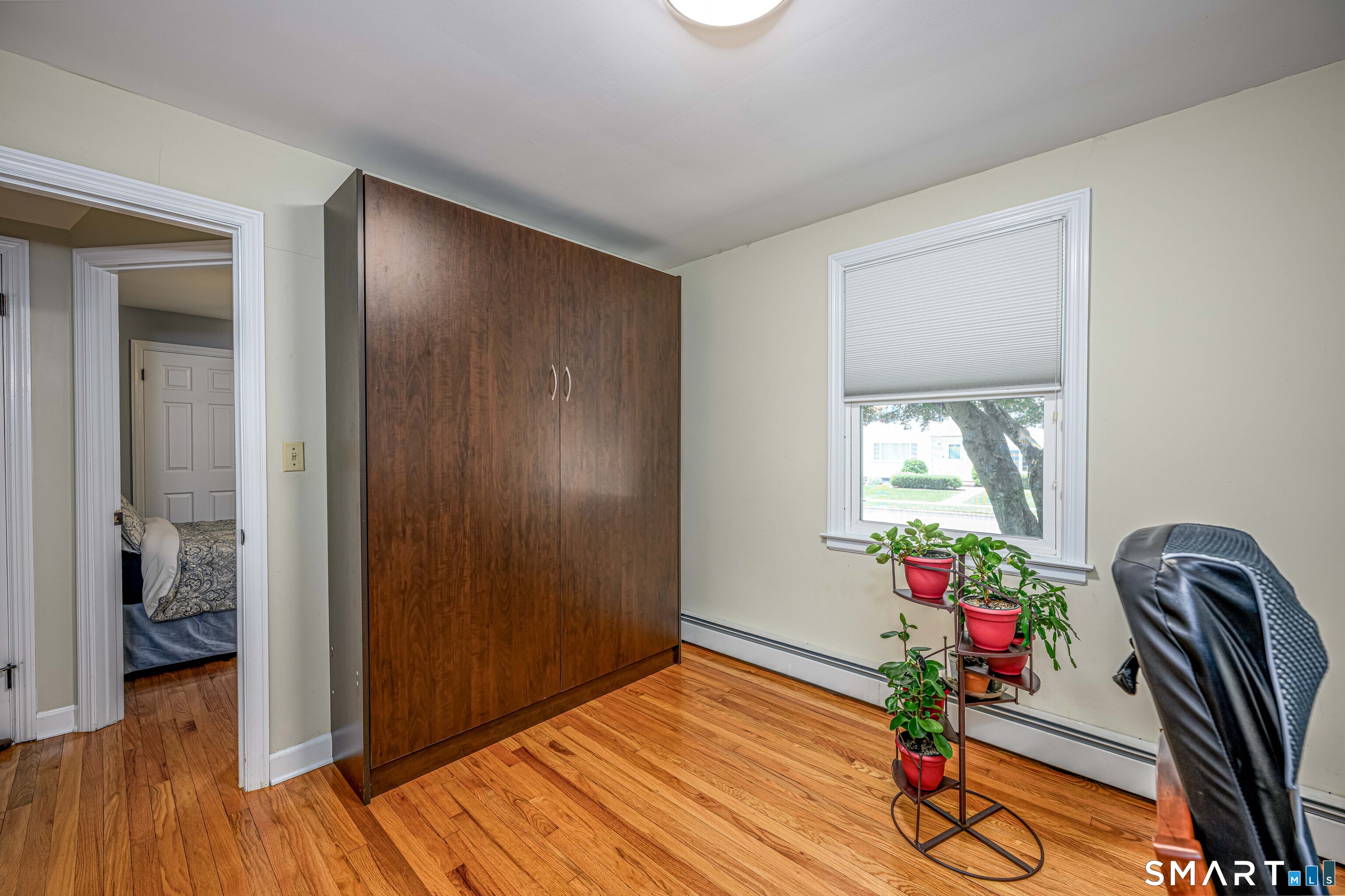 25 Wright Lane Hamden, CT 06517 - Photo 28 of 38 ....the murphy bed easily makes this a multipurpose room. Murphy bed stays!