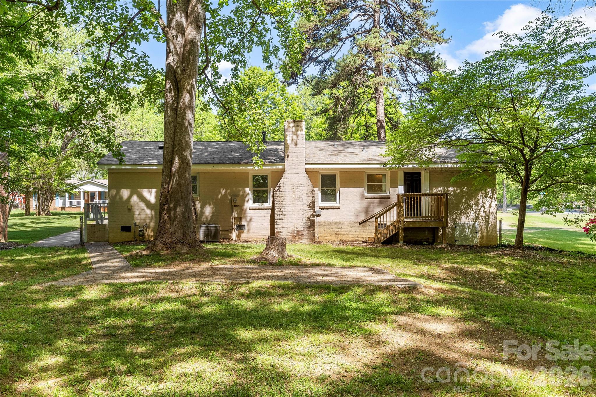 7001 Crossridge Road Charlotte, NC 28214 - Photo 15 of 30 a view of a house with backyard