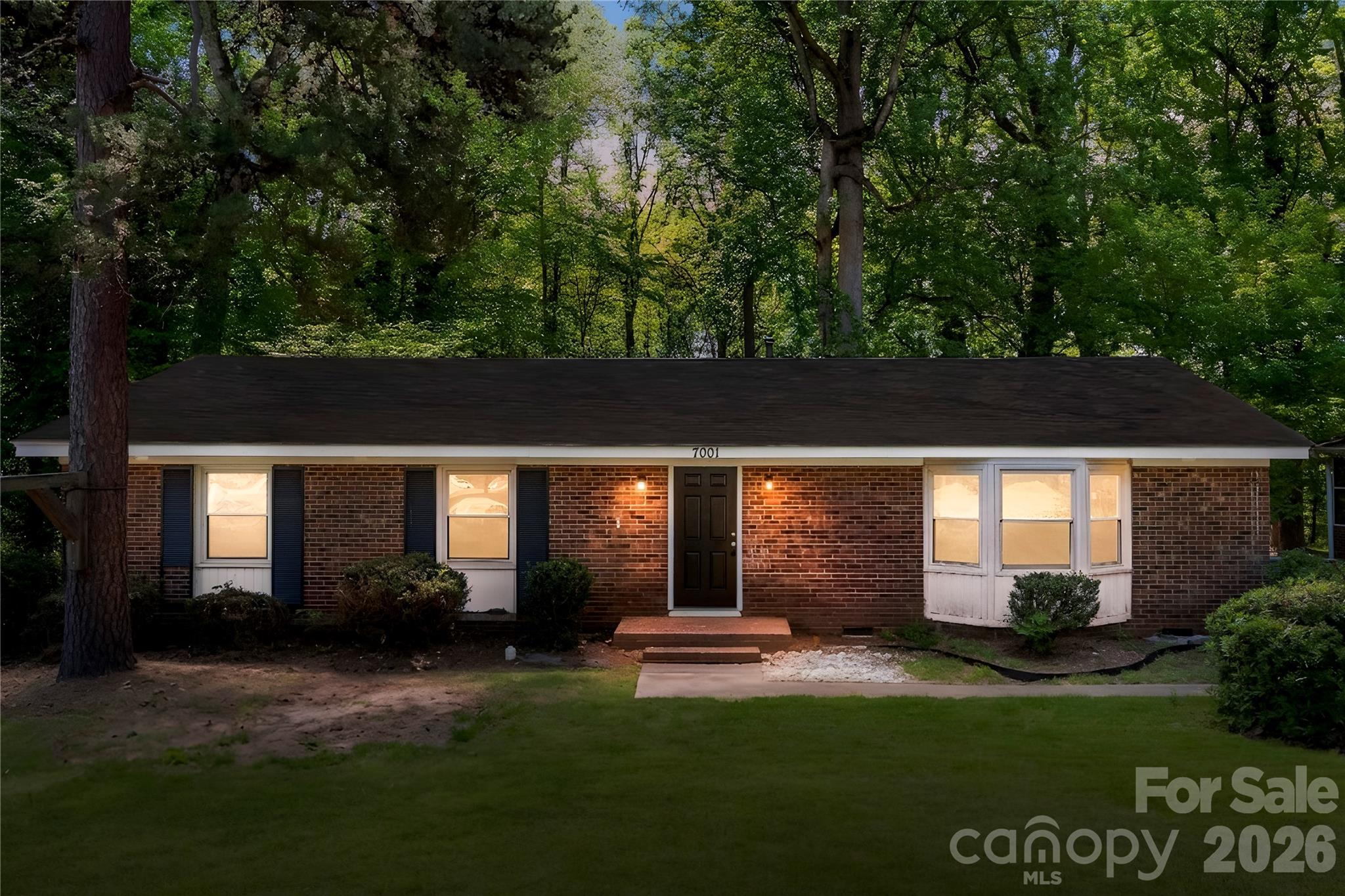 7001 Crossridge Road Charlotte, NC 28214 - Photo 17 of 30 a view of backyard with a garden