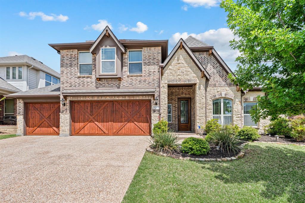 5209 Edgebrook Way Fort Worth, TX 76244 - Photo 1 of 33 a front view of a house with a yard and potted plants