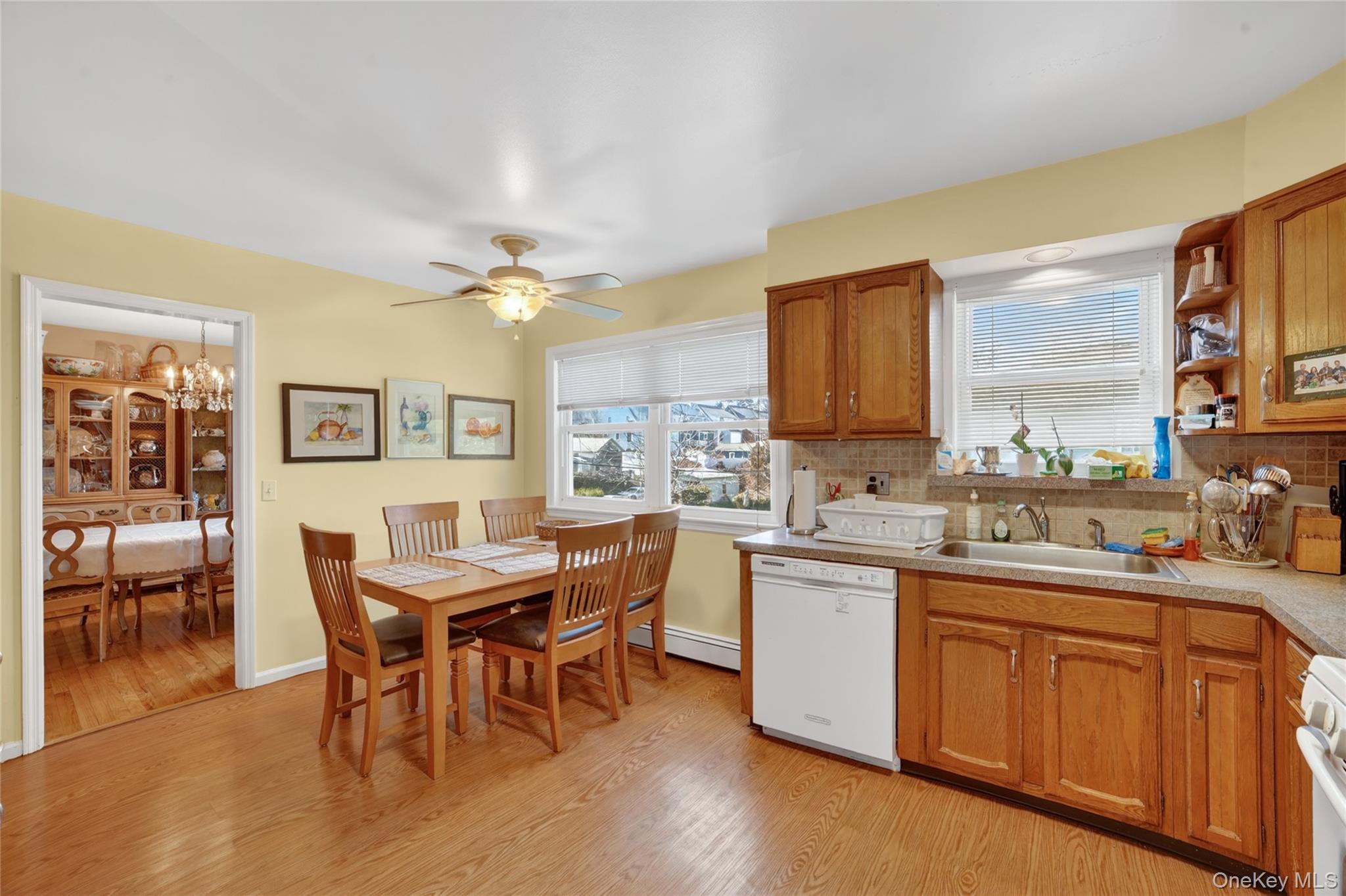 276 5th Avenue New Rochelle, NY 10801 - Photo 14 of 40 a view of a dining room with furniture and wooden floor