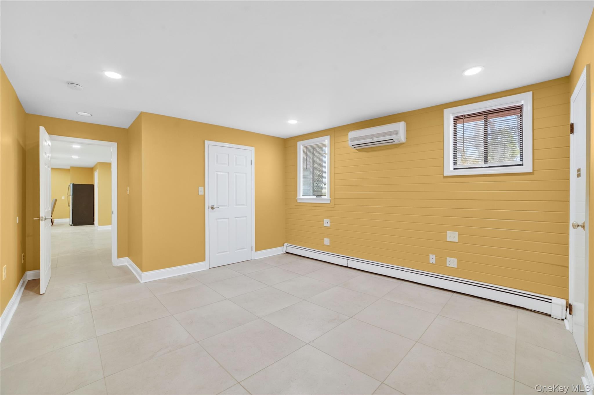 276 5th Avenue New Rochelle, NY 10801 - Photo 29 of 40 a view of an empty room with a window