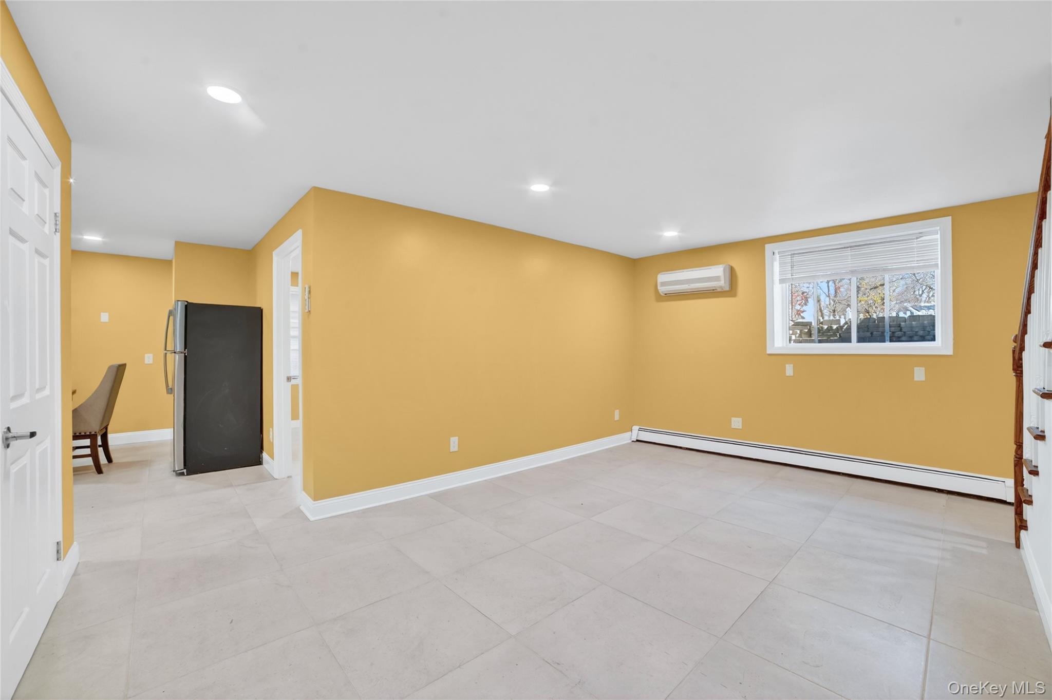 276 5th Avenue New Rochelle, NY 10801 - Photo 30 of 40 a view of an empty room with a window