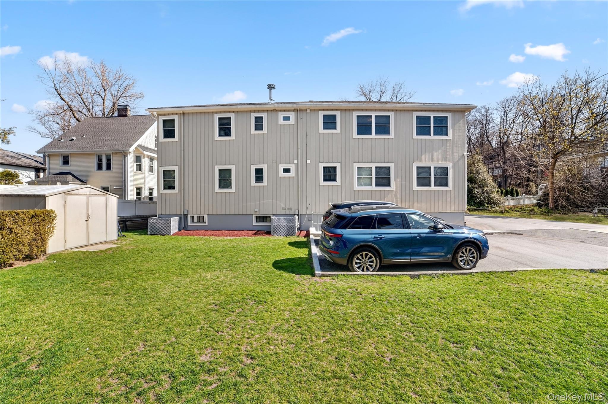 276 5th Avenue New Rochelle, NY 10801 - Photo 39 of 40 a house view with a garden space