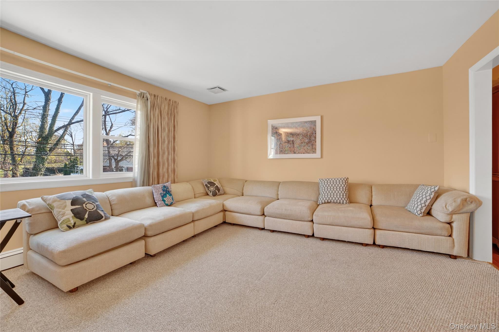 276 5th Avenue New Rochelle, NY 10801 - Photo 7 of 40 a living room with furniture and a large window