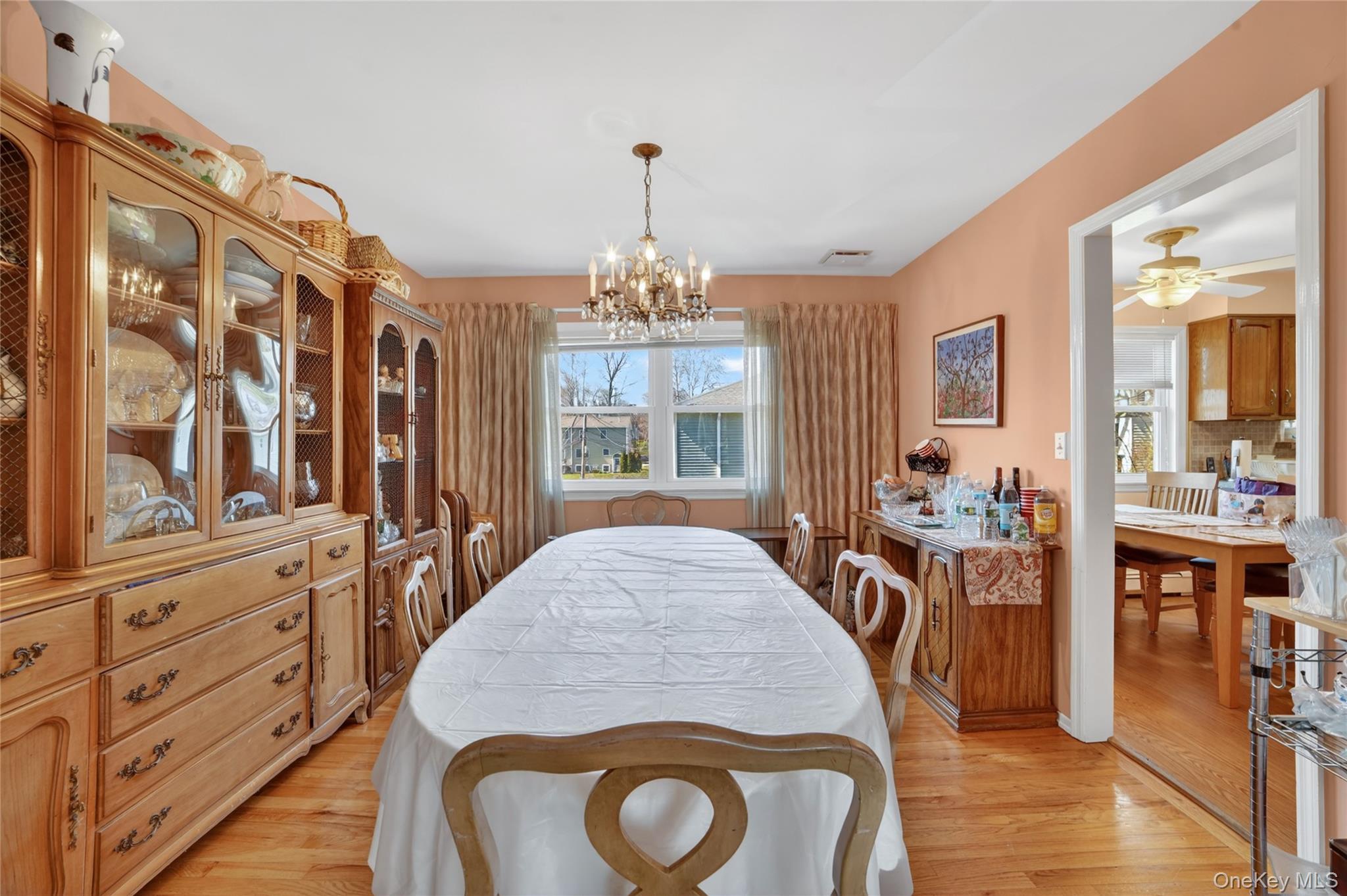 276 5th Avenue New Rochelle, NY 10801 - Photo 9 of 40 a view of a dining room with furniture and chandelier