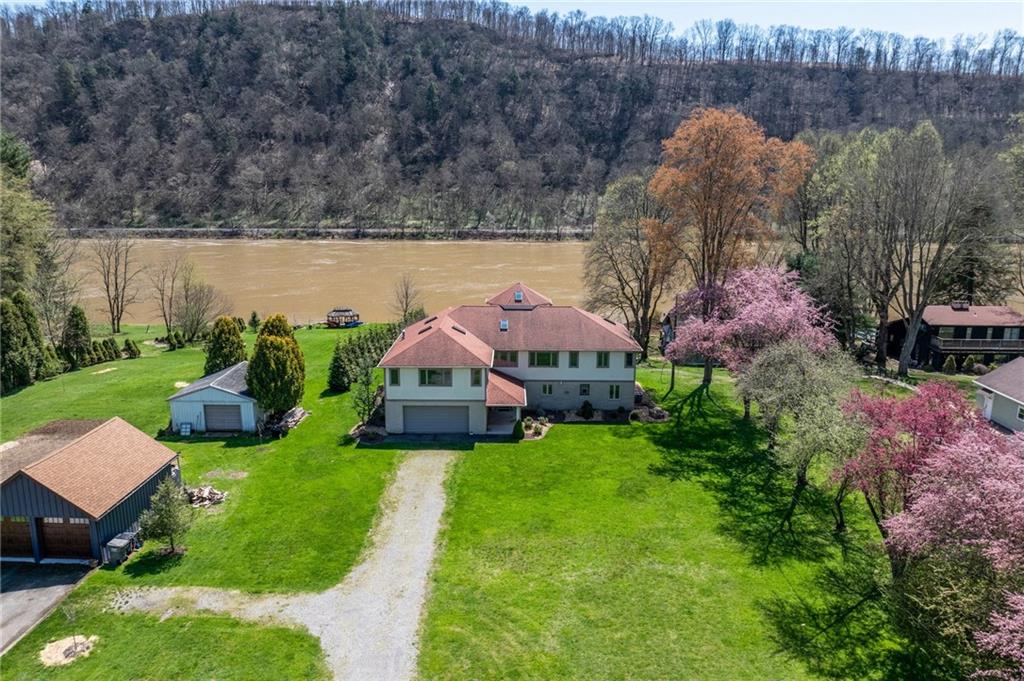 1184 River Road Freeport, PA 16229 - Photo 1 of 25 a view of a garden with lawn chairs