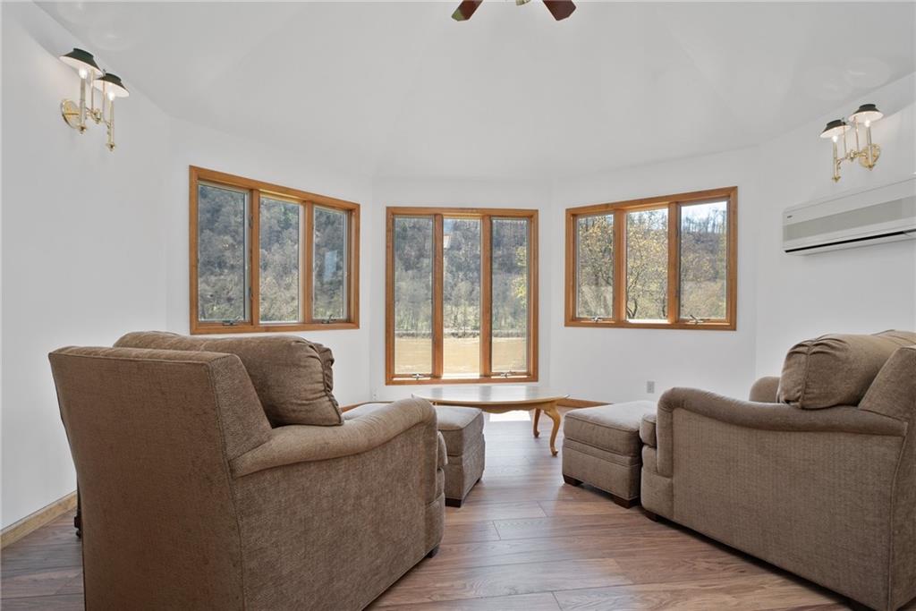 1184 River Road Freeport, PA 16229 - Photo 11 of 25 a living room with furniture and a window