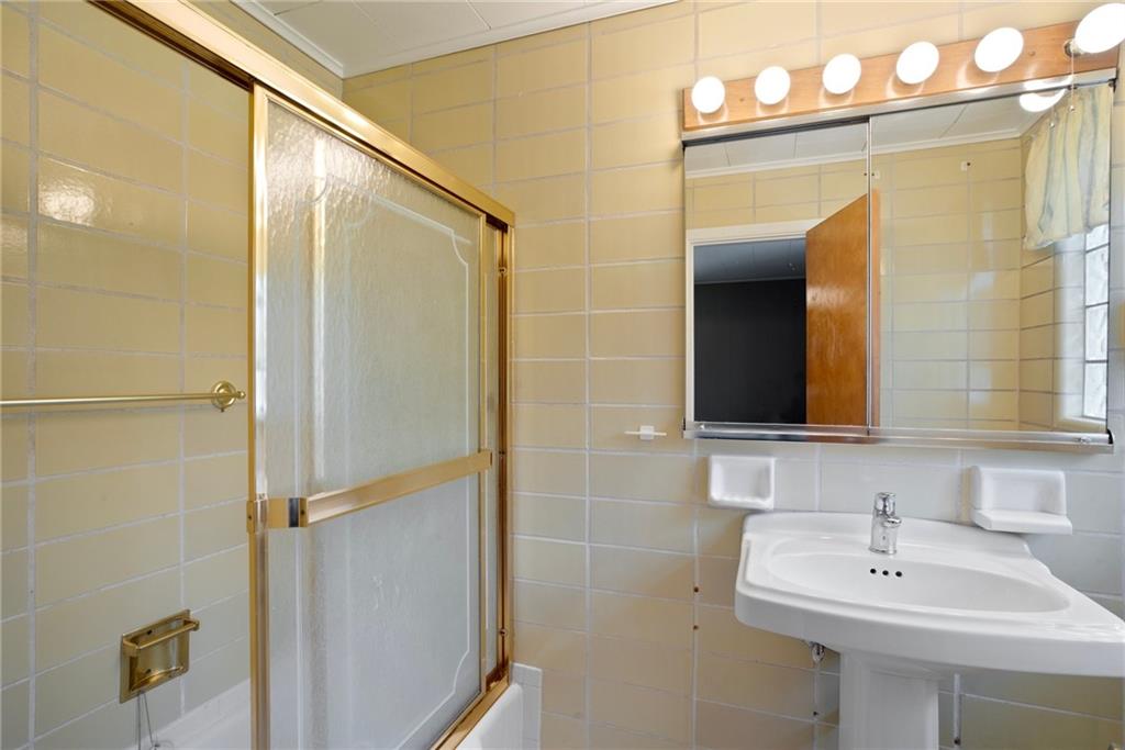 1184 River Road Freeport, PA 16229 - Photo 19 of 25 a bathroom with a sink and a mirror