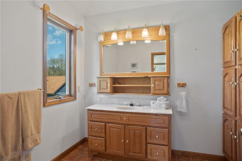 1184 River Road Freeport, PA 16229 - Photo 21 of 25 a bathroom with a sink and a mirror