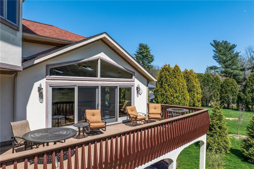 1184 River Road Freeport, PA 16229 - Photo 23 of 25 a view of a house with wooden deck and furniture
