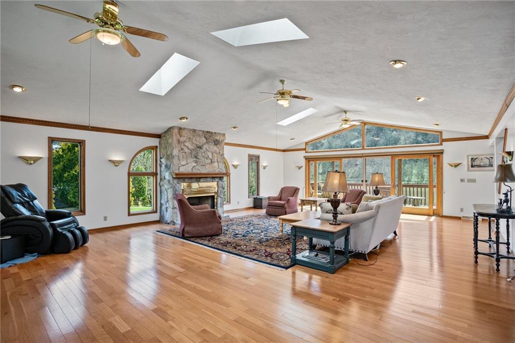 1184 River Road Freeport, PA 16229 - Photo 4 of 25 a living room with fireplace furniture and a large window