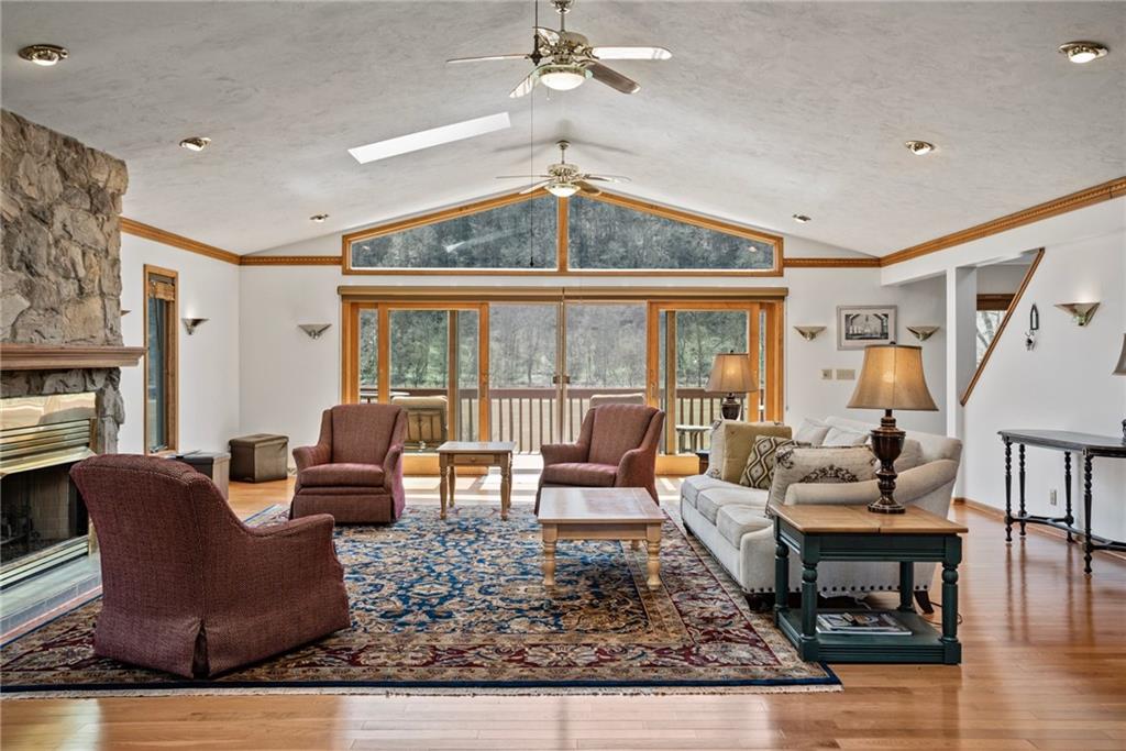 1184 River Road Freeport, PA 16229 - Photo 5 of 25 a living room with furniture a rug and a large window