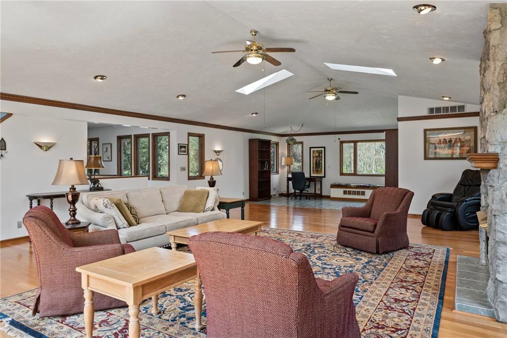 1184 River Road Freeport, PA 16229 - Photo 7 of 25 a living room with furniture ceiling fan and a rug