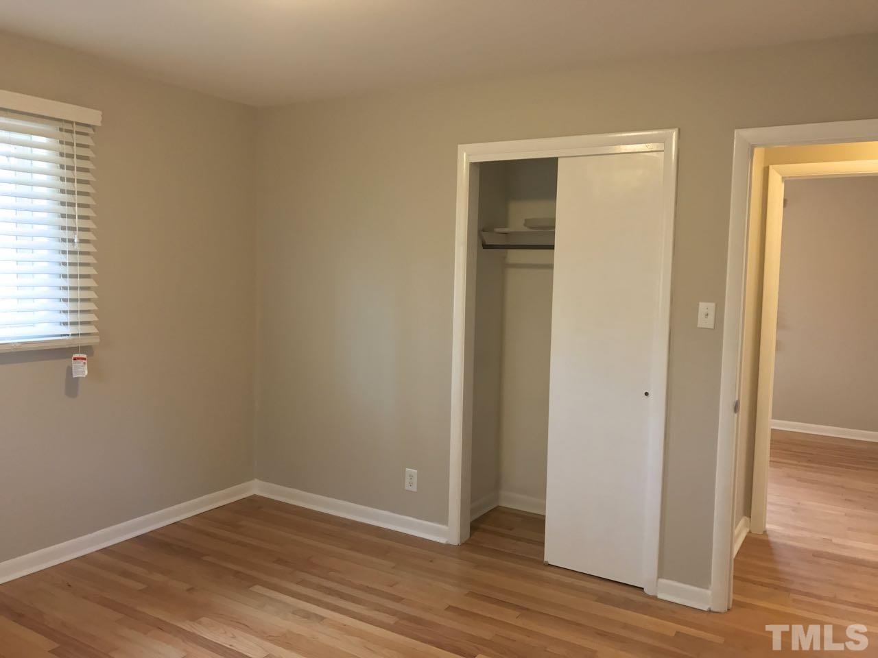 111 Barclay Road Durham, NC 27712 - Photo 13 of 21 an empty room with wooden floor and closet